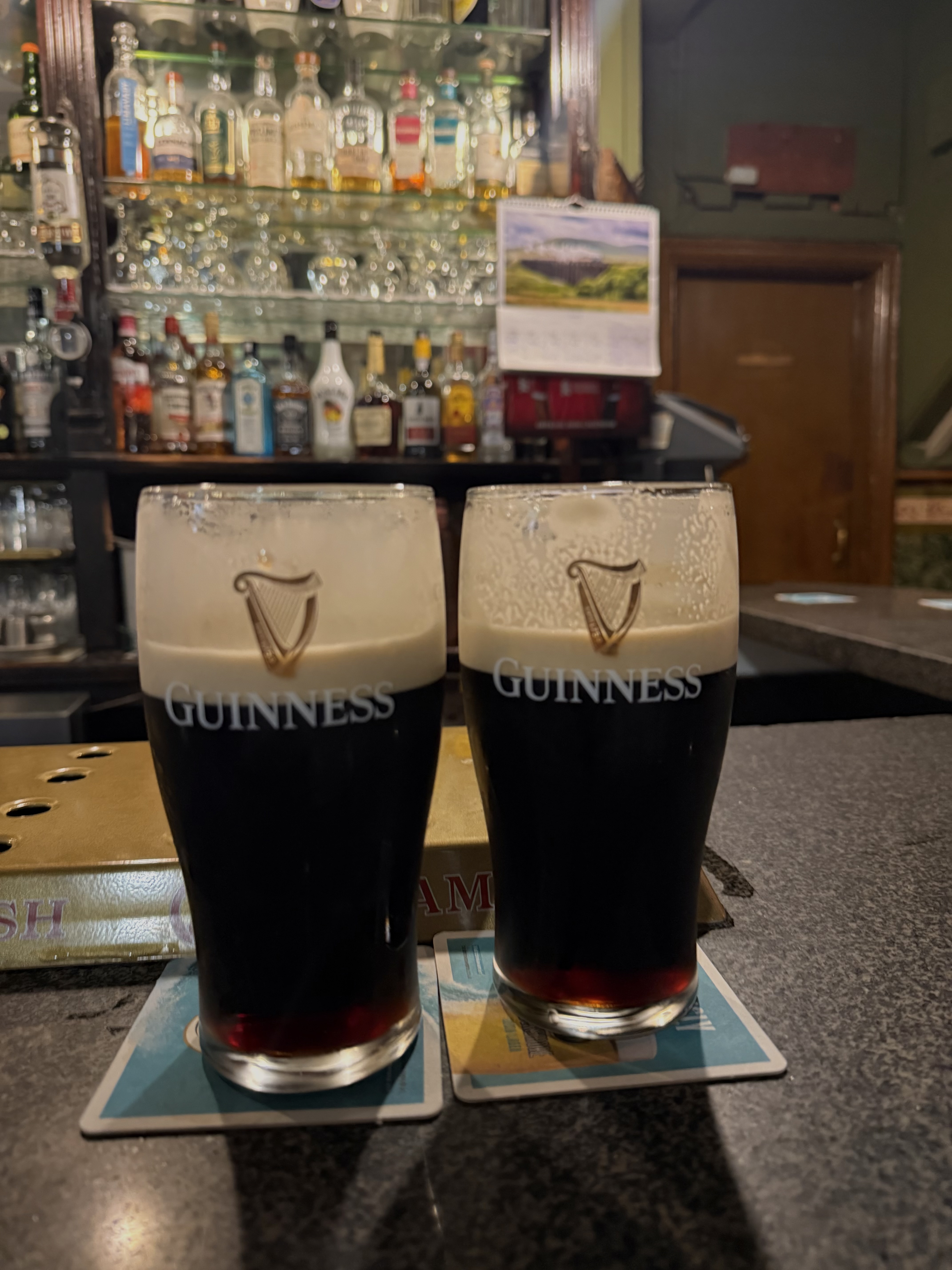 two Guinness pints