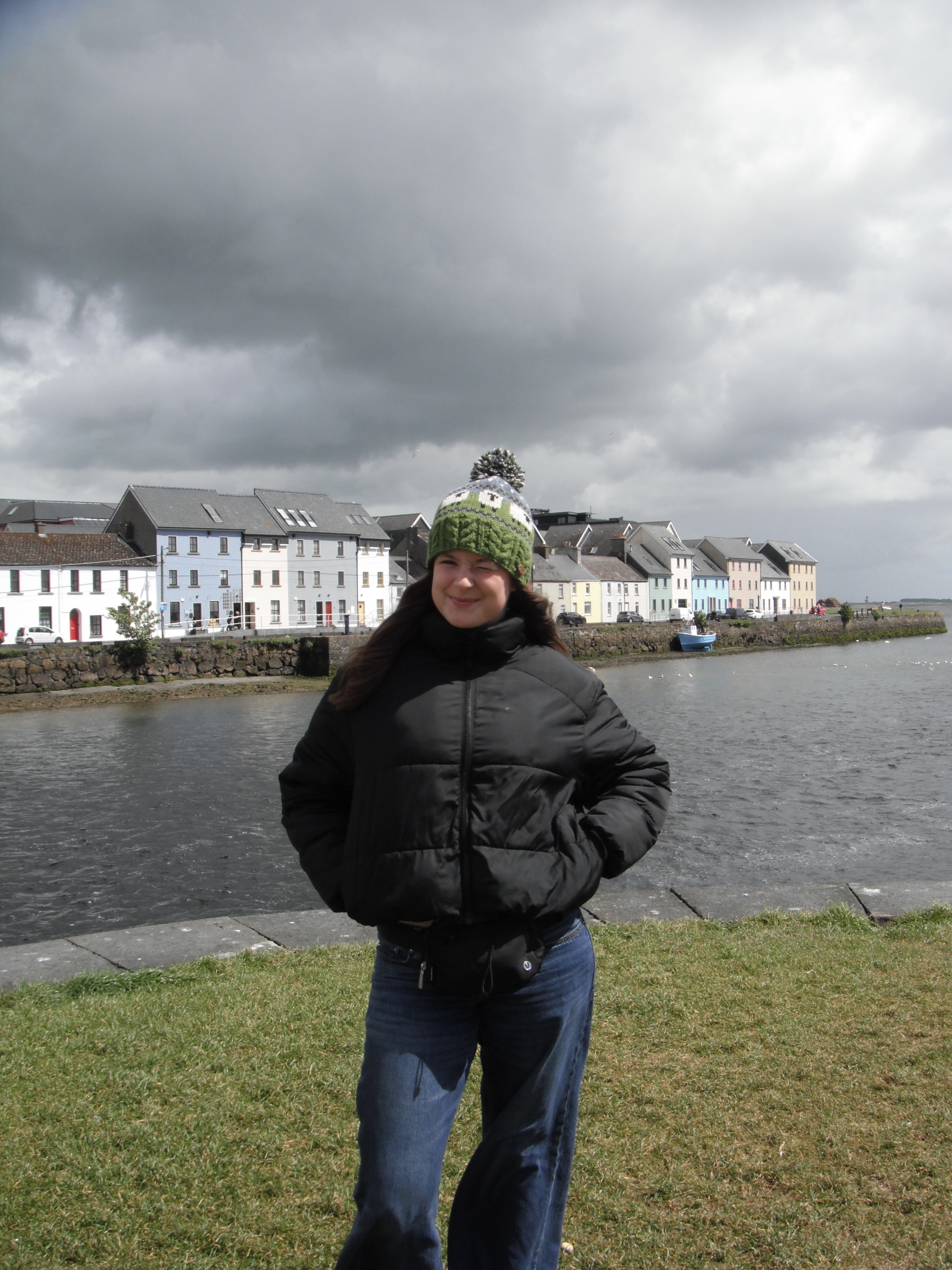mia in front of river and colorful houses