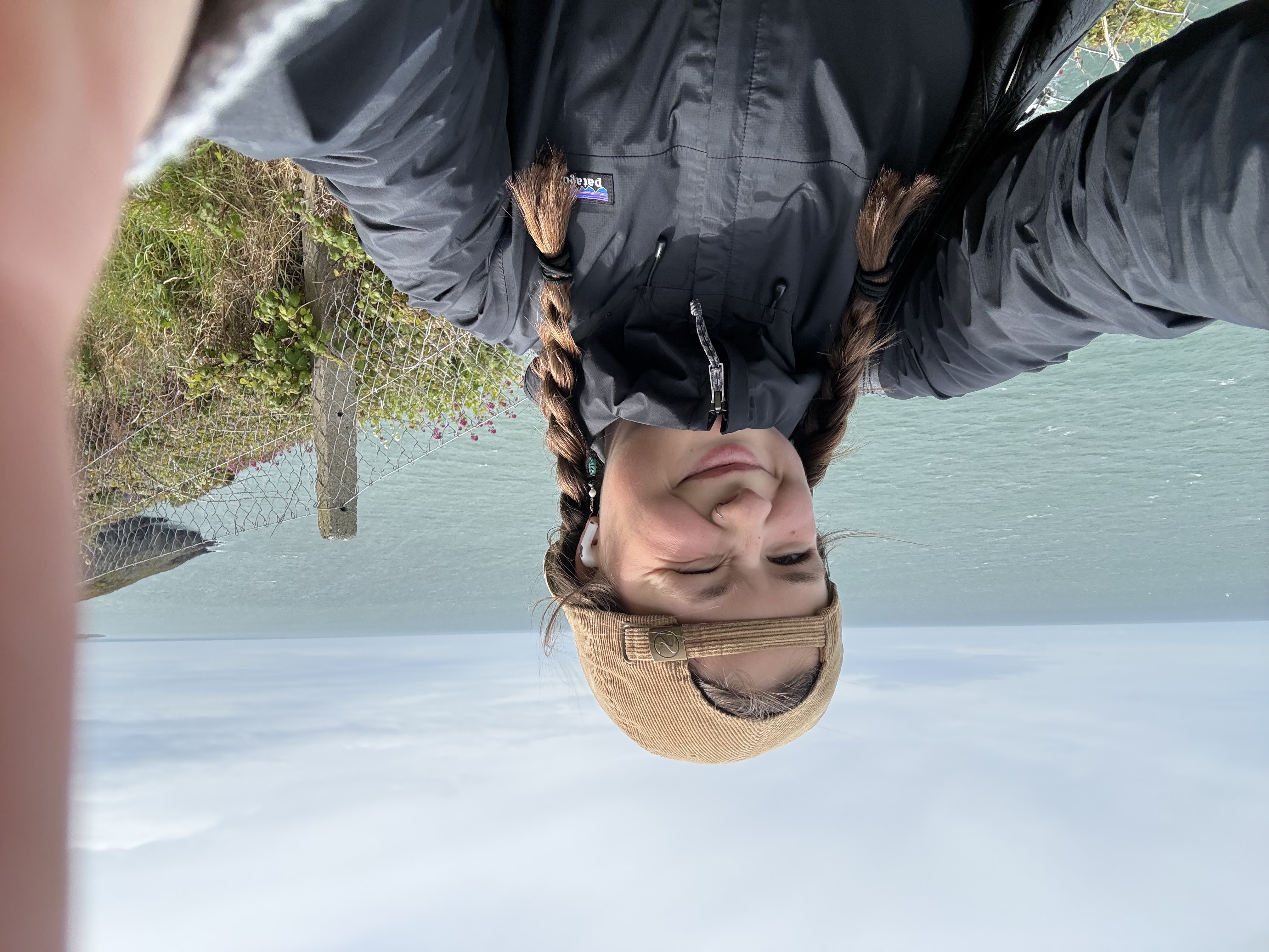 mia taking a selfie in front of ocean